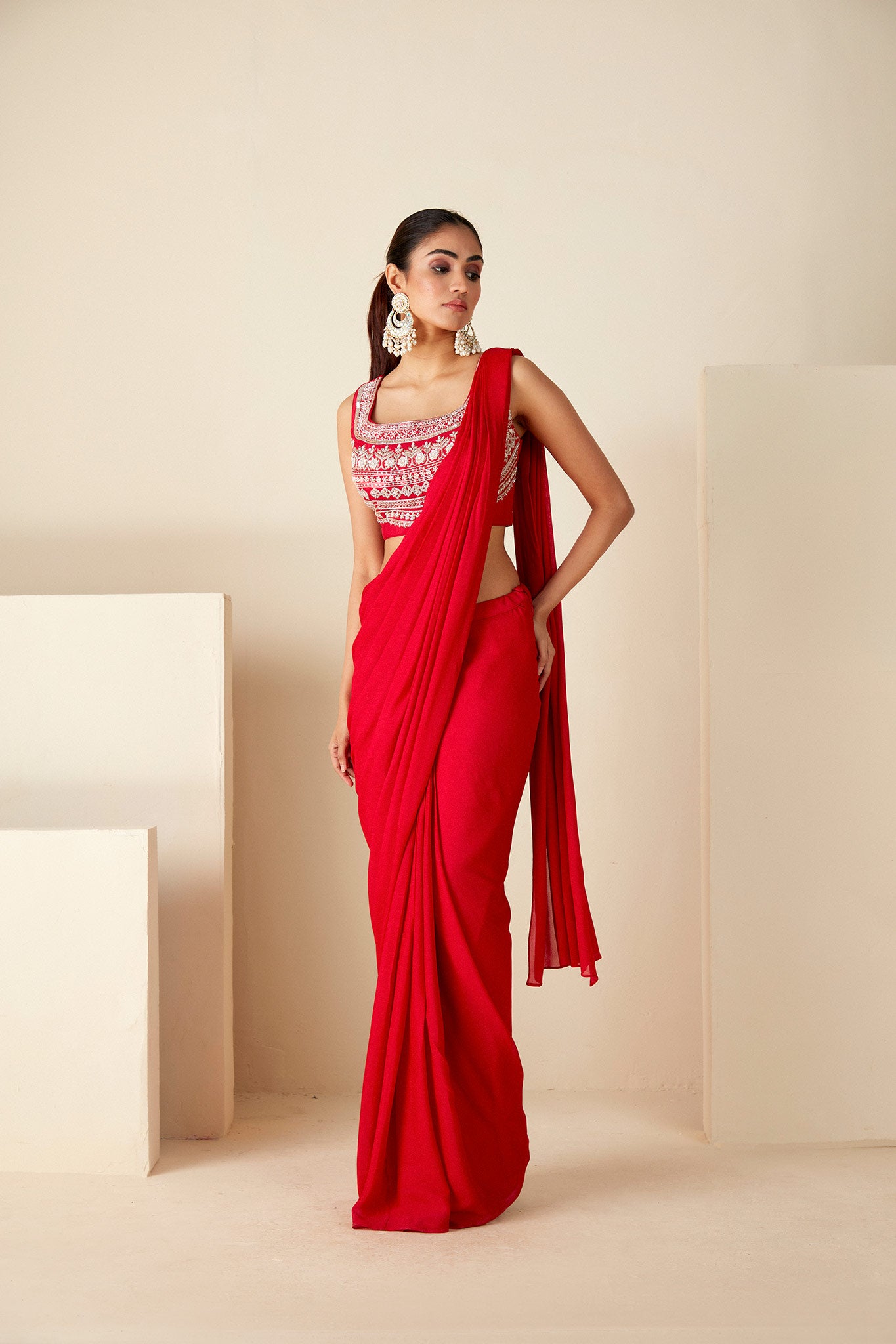 Red pre-draped Saree