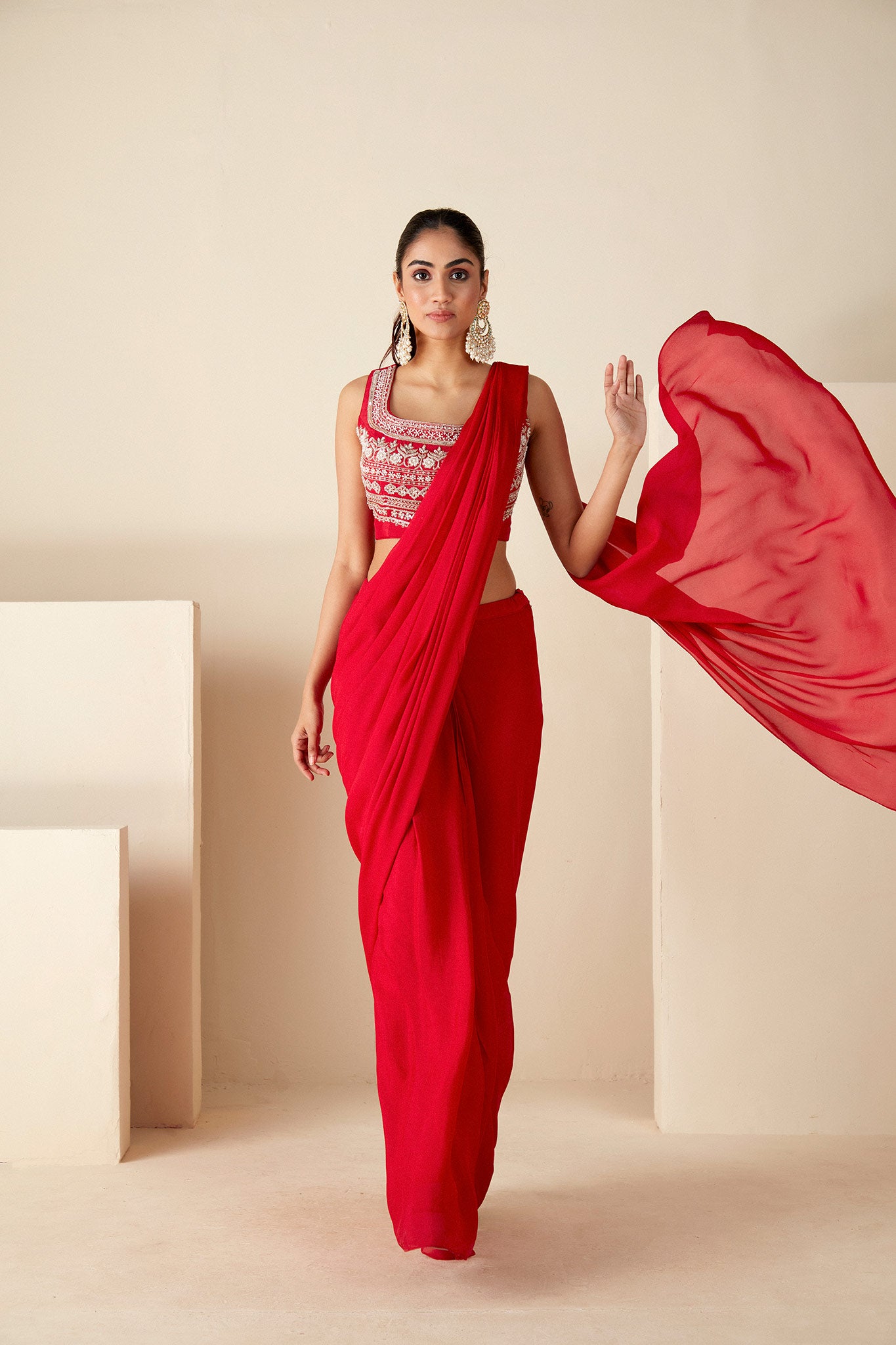 Red pre-draped Saree