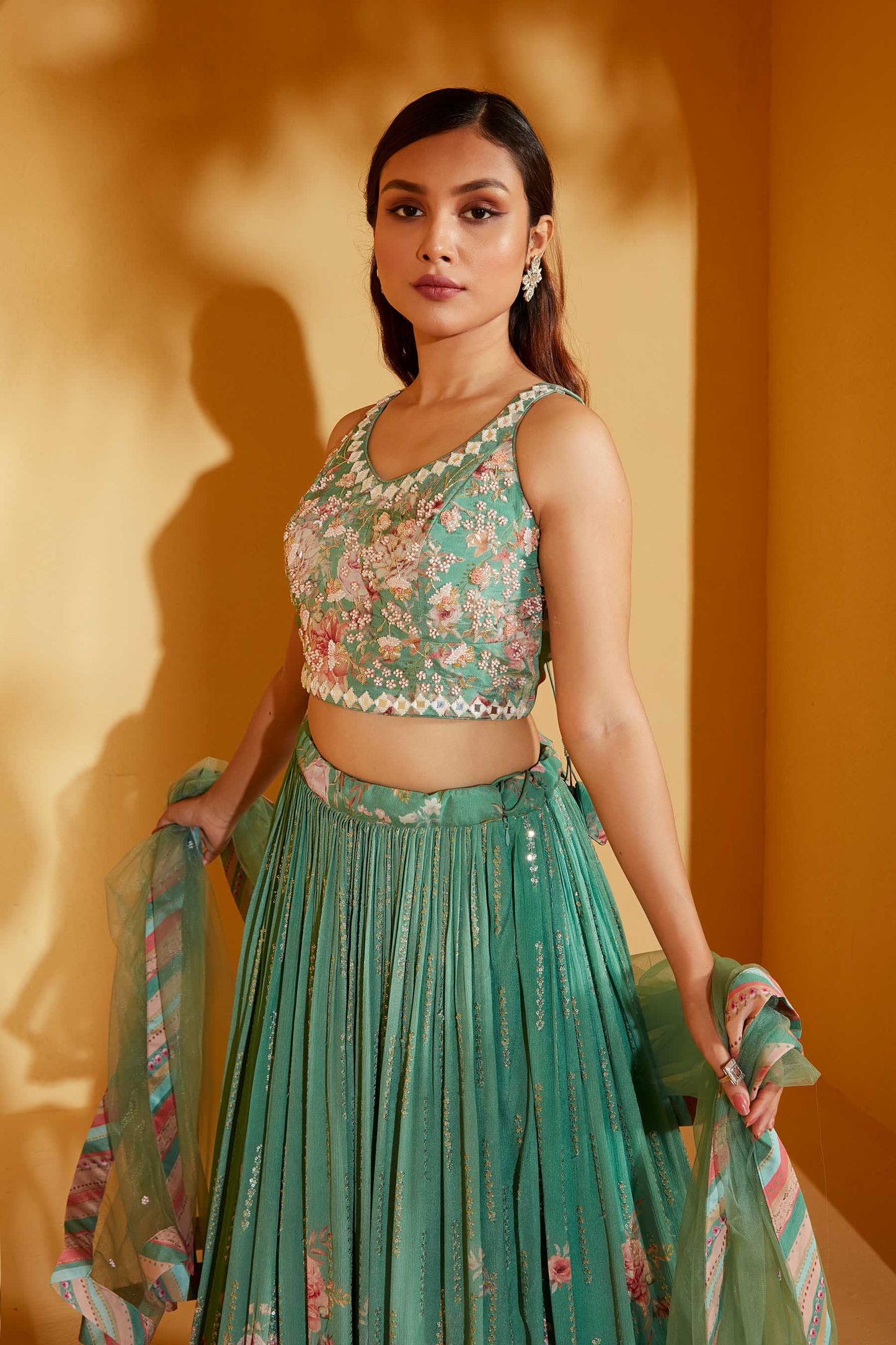 GREEN SLEEVELESS LEHENGA SET