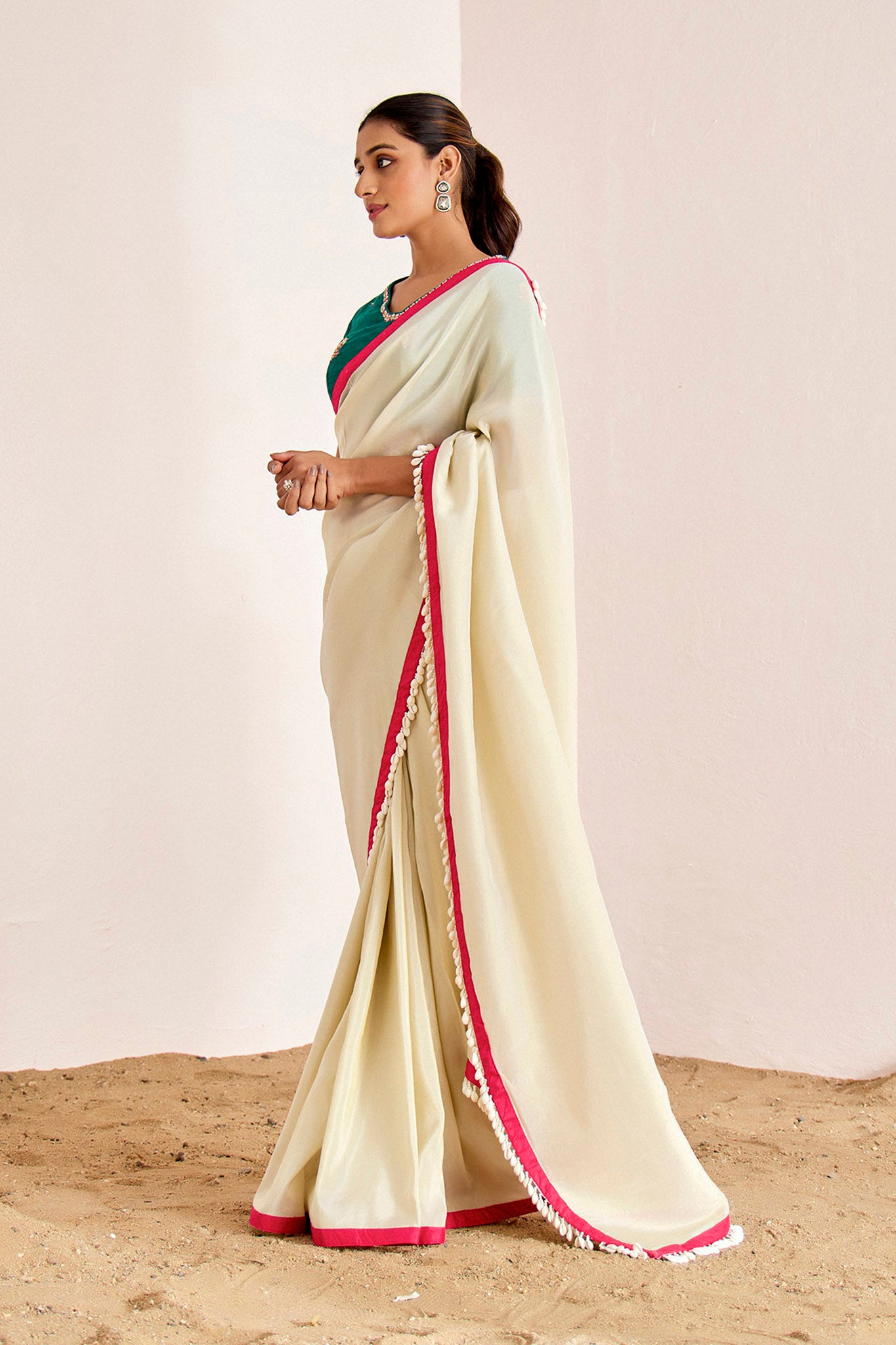 OFF WHITE SHIMMER SAREE WITH GREEN BLOUSE