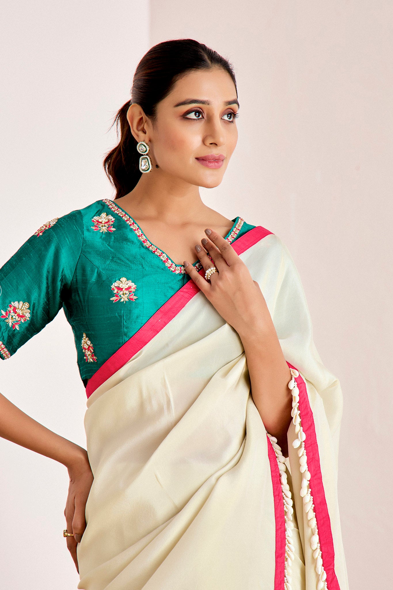 OFF WHITE SHIMMER SAREE WITH GREEN BLOUSE