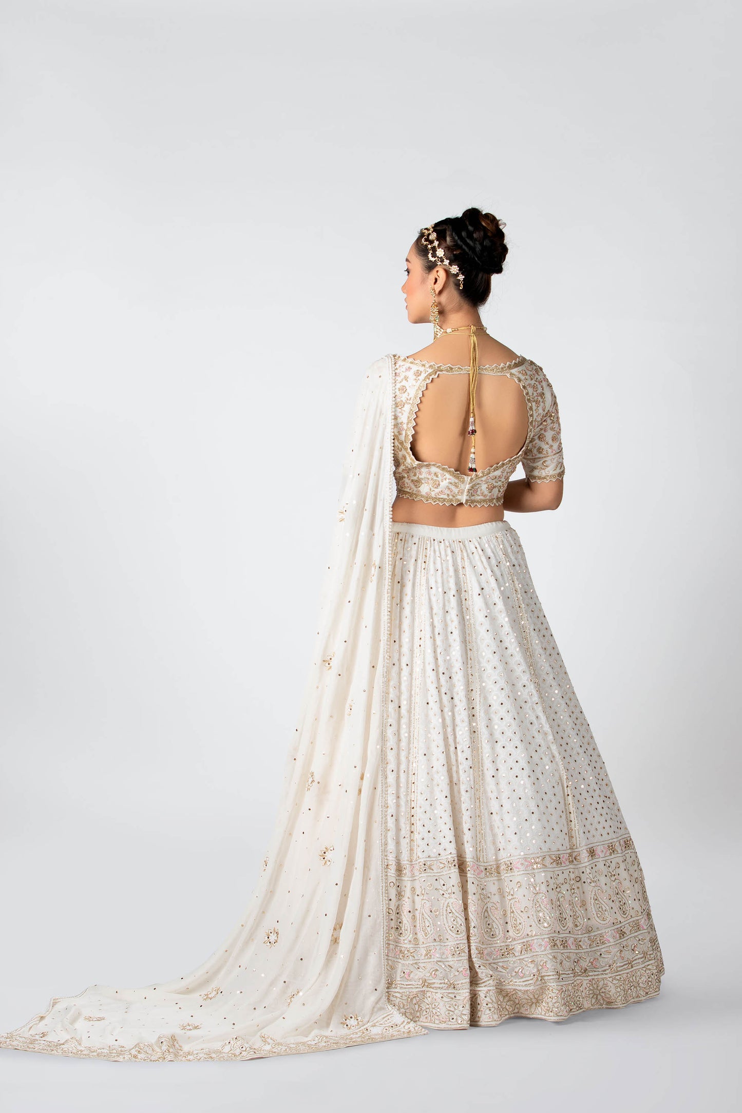 Off-white hand embroidered bridal lehenga set