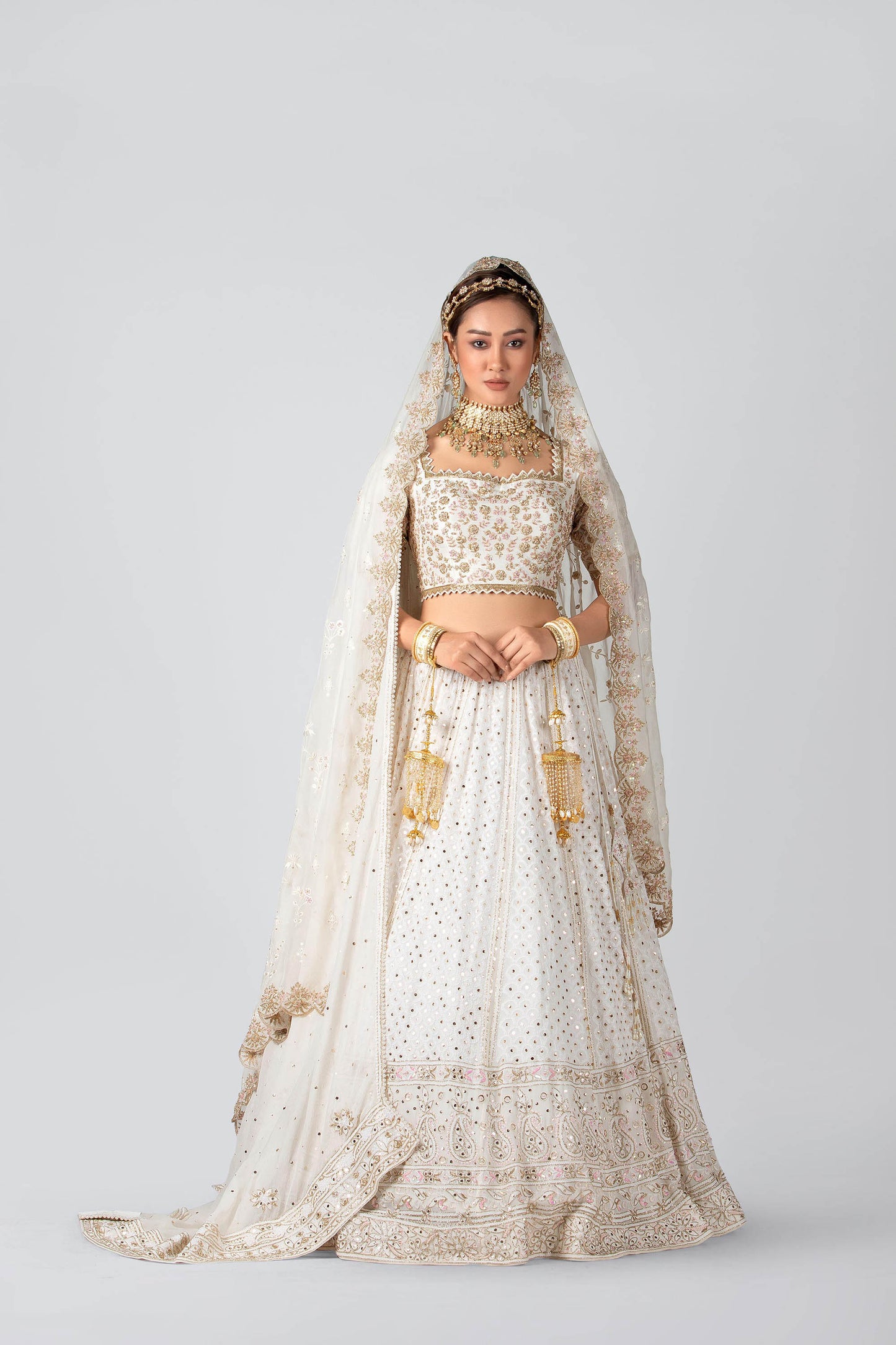 Off-white hand embroidered bridal lehenga set