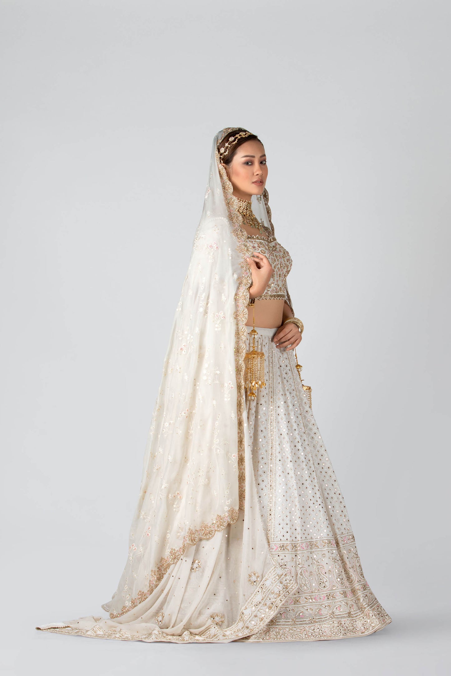 Off-white hand embroidered bridal lehenga set