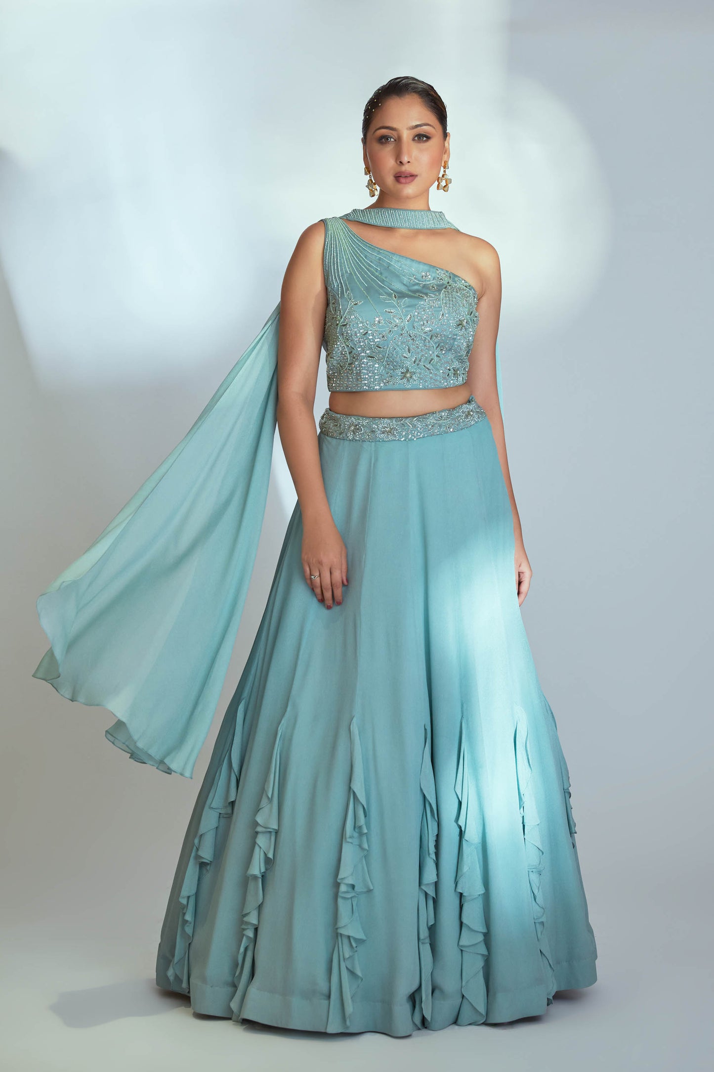 Sea green one shoulder lehenga set