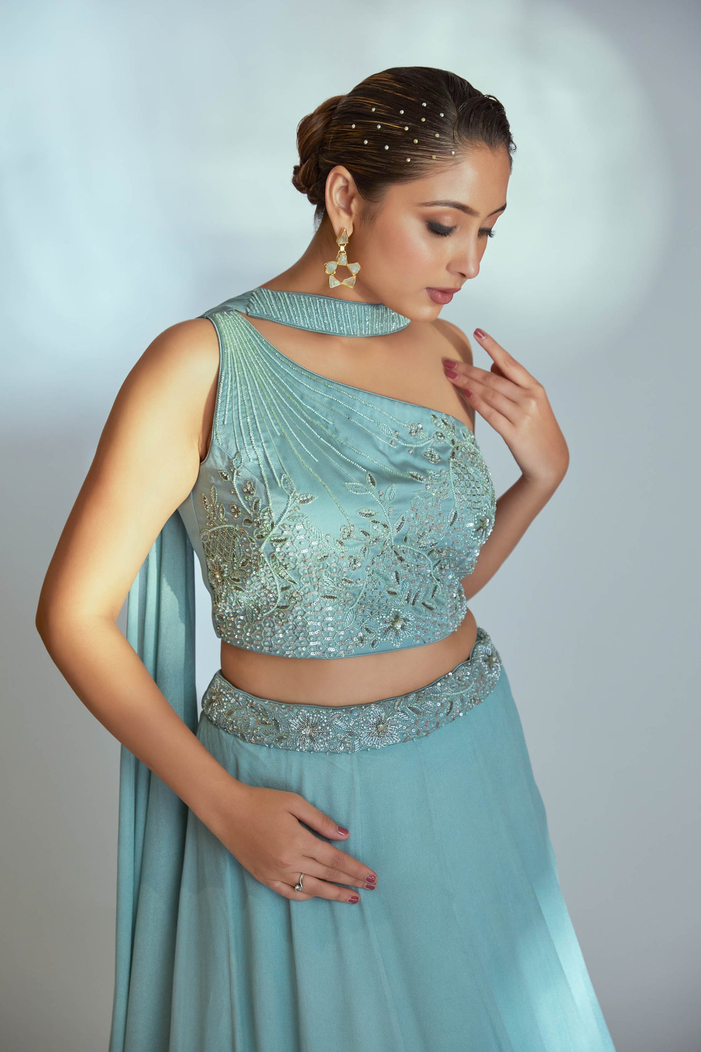 Sea green one shoulder lehenga set