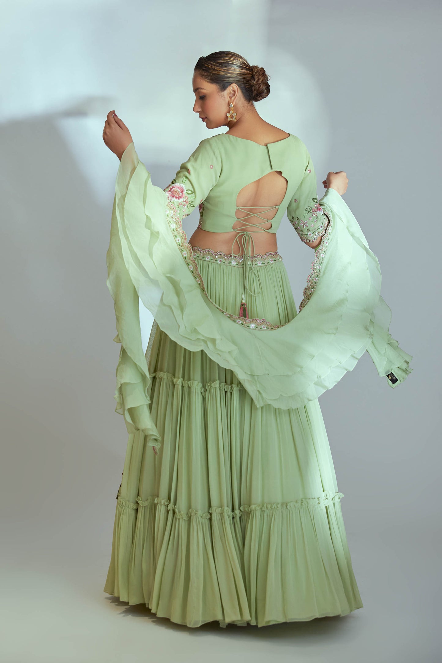 Green layer thread work lehenga set