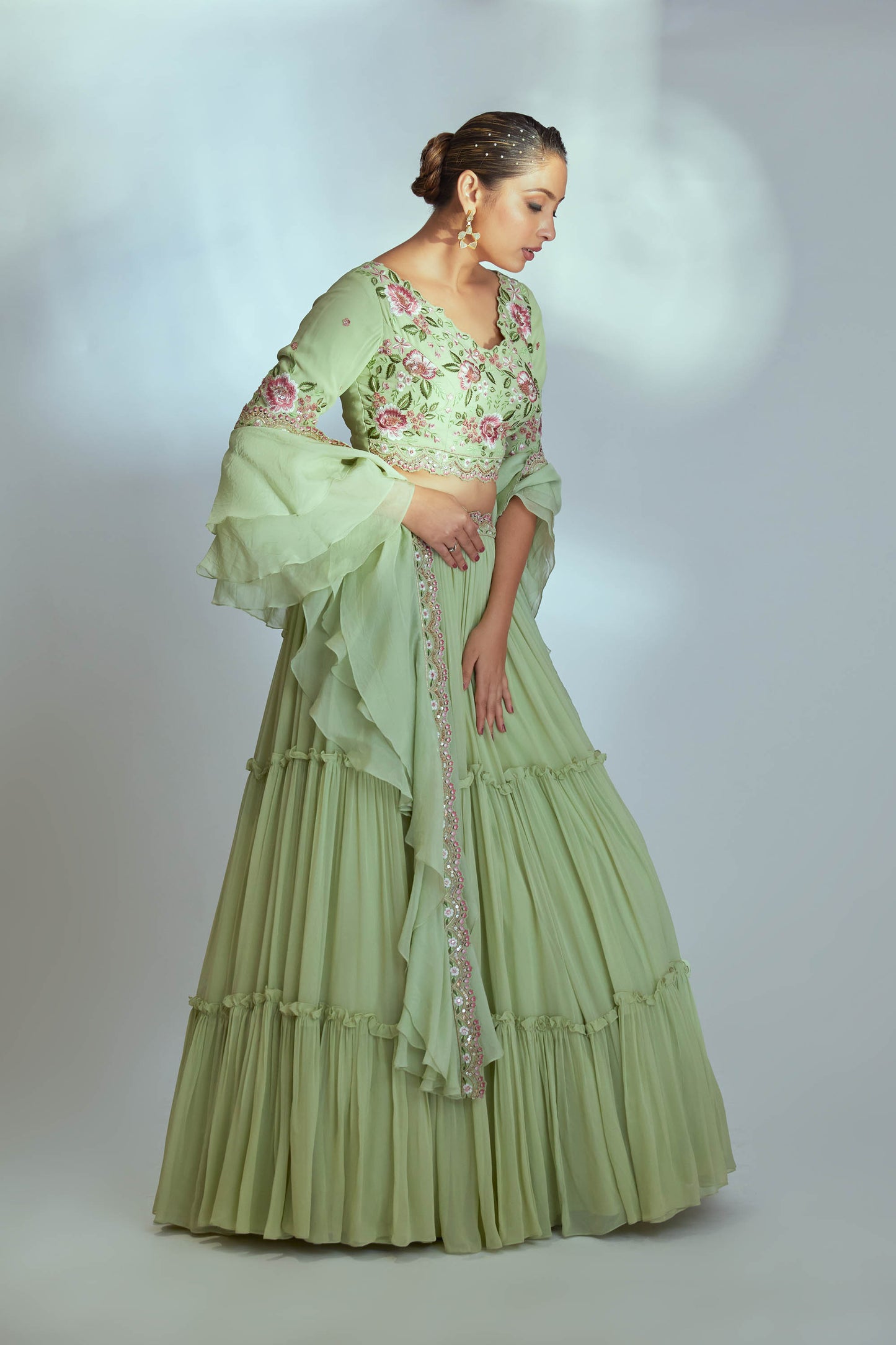 Green layer thread work lehenga set